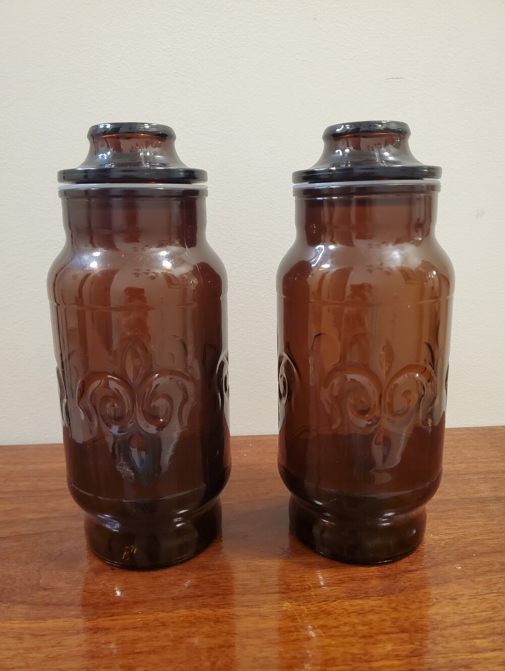 (2) 1970s Borden Cremora amber glass canisters